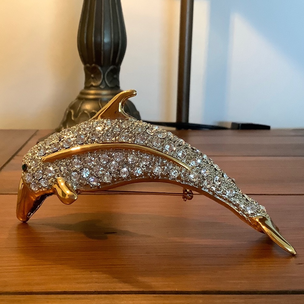 RHINESTONE DOLPHIN SHOULDER BROOCH WITH EMERALD GREEN EYES